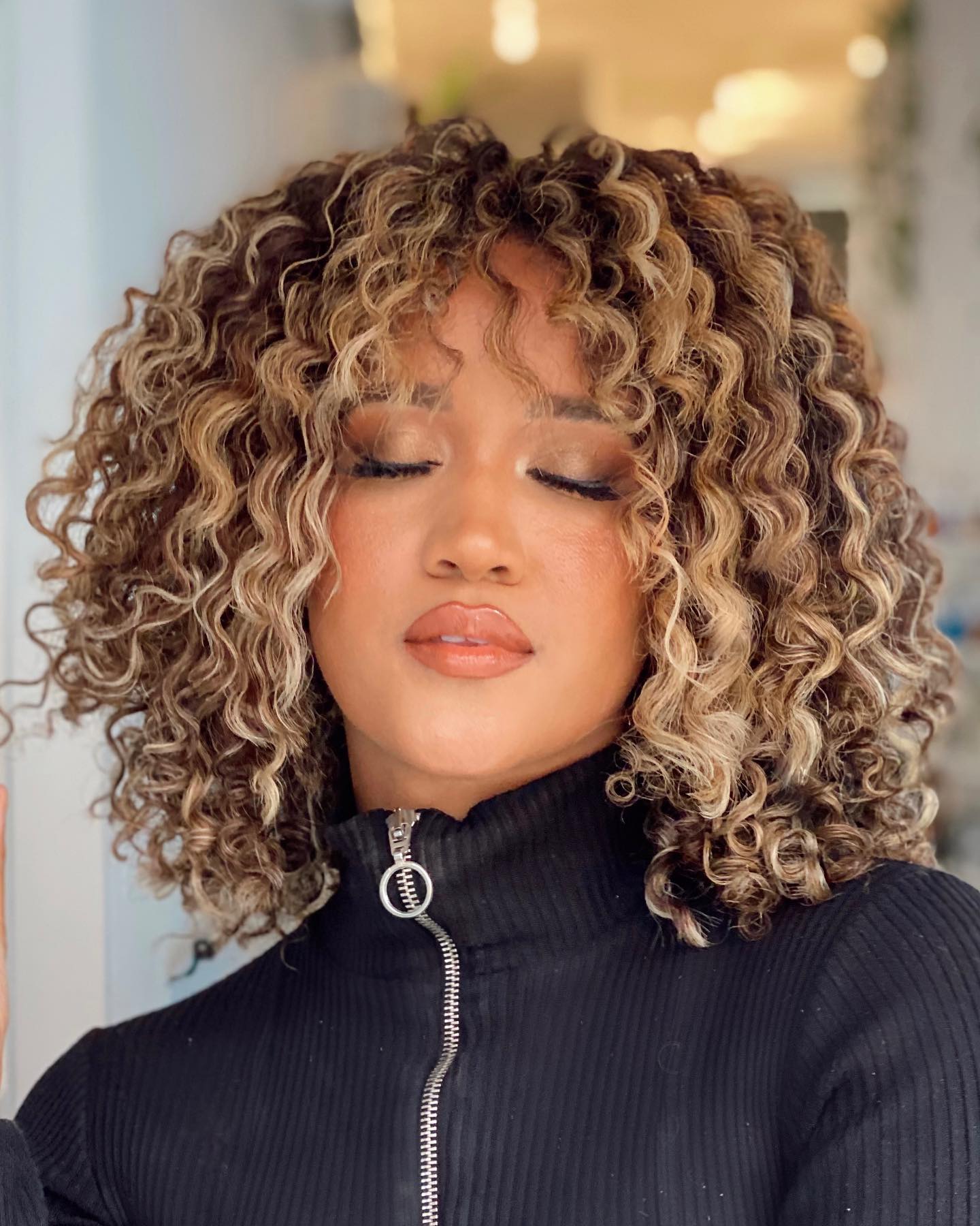 Defined Curls on a Layered Bob Defined Curls on a Layered Bob — Winter Hairstyles for Round Faces