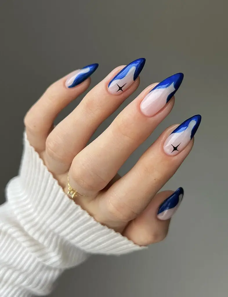 Deep Blue Swirls with Black Stars Deep Blue Swirls with Black Stars — Winter Almond Nails