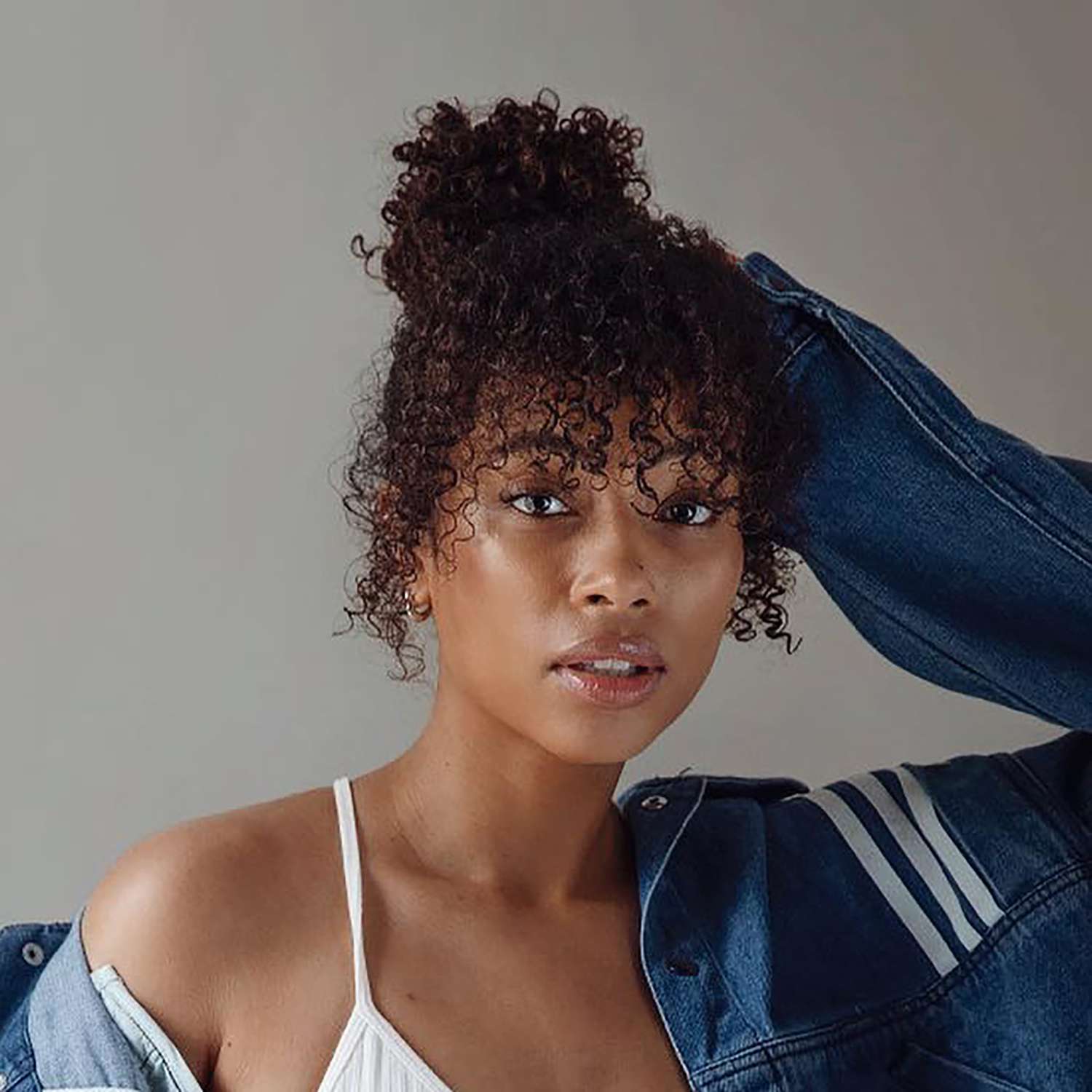 Voluminous Black Curly Updo — Winter Hairstyles for Curly Hair