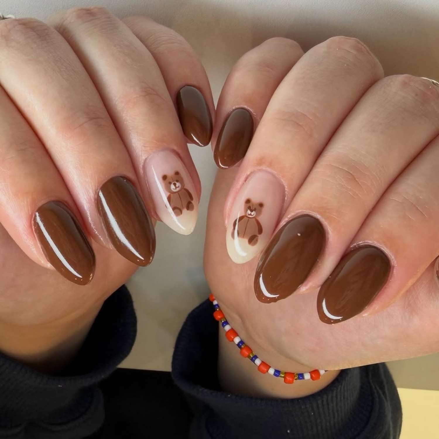 Chic Glossy Brown with Adorable Teddy Bear Accents Chic Glossy Brown with Adorable Teddy Bear Accents — Cute Winter Nails