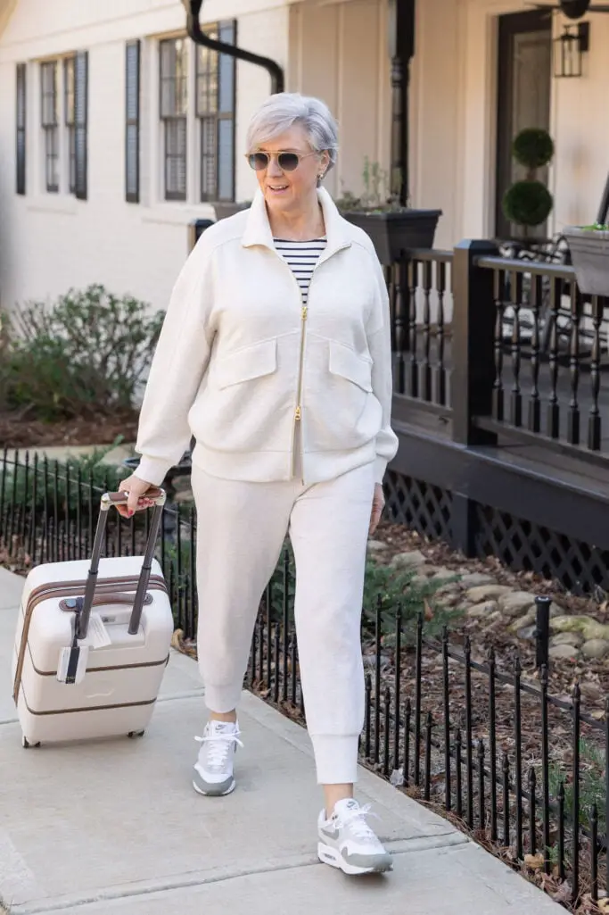 Cream Knit Tracksuit Set with Striped Tee and Sneakers — Casual Winter Outfits for Women Over 50
