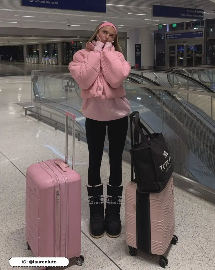 Pink Puffer Jacket and Sweatshirt with Snow Boots Pink Puffer Jacket and Sweatshirt with Snow Boots — Winter Airport Outfits