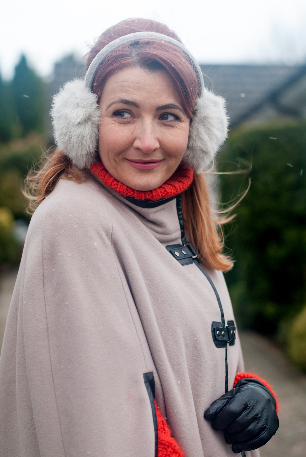 Warm Poncho with Bold Red Accents Warm Poncho with Bold Red Accents — Winter Outfits for Women Over 40
