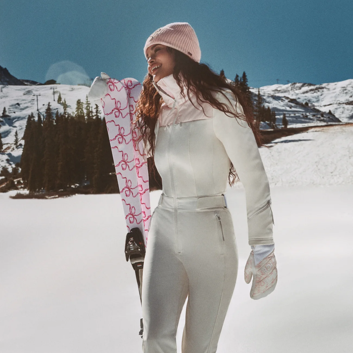 Fitted White Ski Suit with Pink Accents for Winter Sports — Winter Workout Outfits