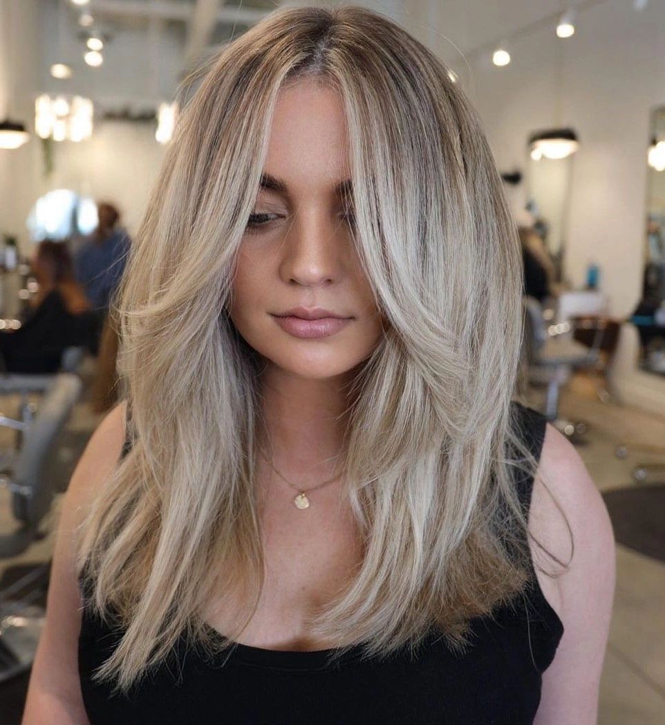 Medium-Length Layered Blonde Hair with Pendant Necklace Medium-Length Layered Blonde Hair with Pendant Necklace — Trendy Haircuts for Women