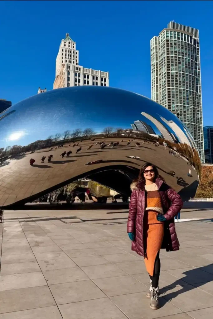 Sightseeing Ready: Burgundy Puffer Coat and Striped Top Sightseeing Ready: Burgundy Puffer Coat and Striped Top — Chicago Winter Outfits