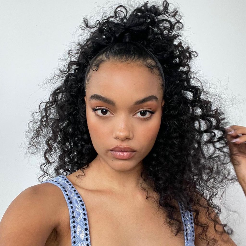 Textured Blonde Shag with Bangs — Winter Hairstyles for Curly Hair
