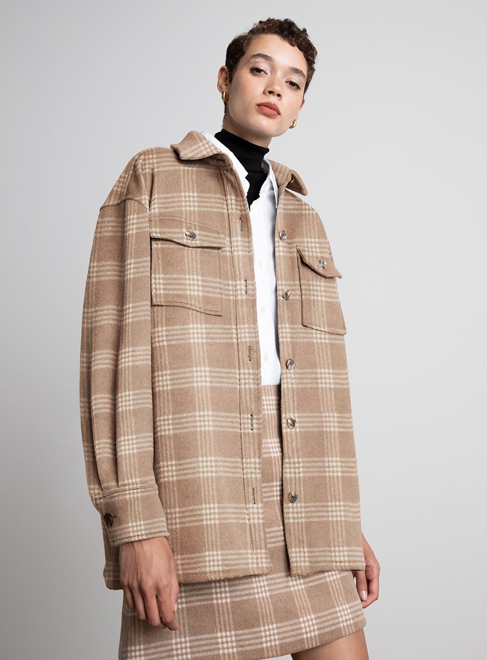 Plaid Shacket and Mini Skirt for a Casual Yet Stylish Concert Outfit Plaid Shacket and Mini Skirt for a Casual Yet Stylish Concert Outfit — Winter Concert Outfits