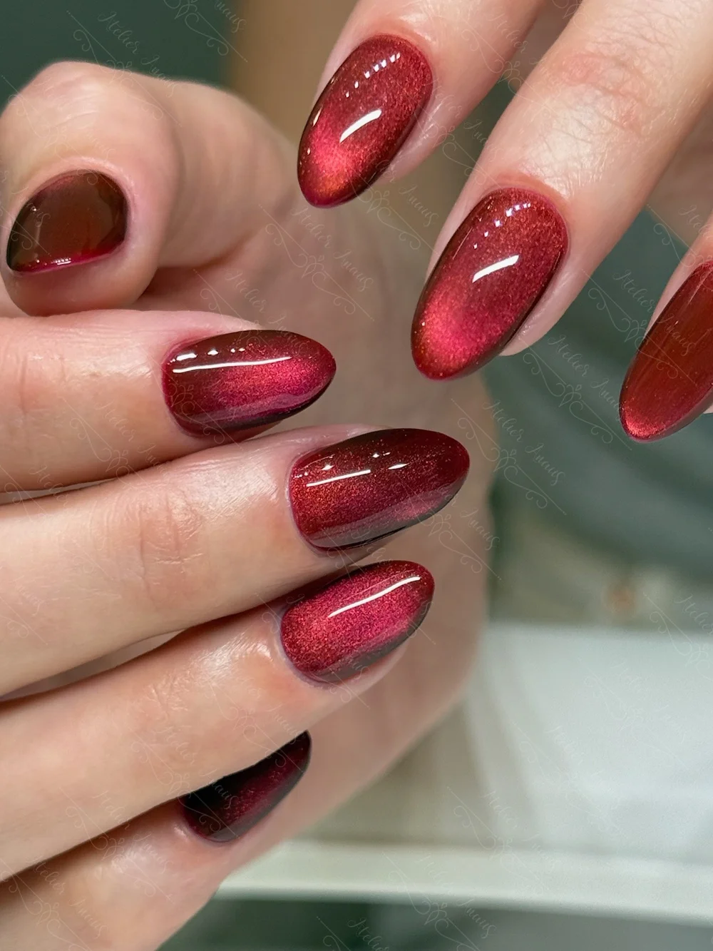 Deep Red Gold Undertone Cat Eye Almond Nails Deep Red Gold Undertone Cat Eye Almond Nails — Velvet Nails