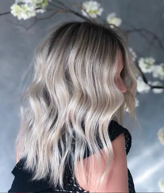 Icy Blonde With Ash Undertones and Wispy Bangs Icy Blonde With Ash Undertones and Wispy Bangs — Winter Hair Colors for Blondes