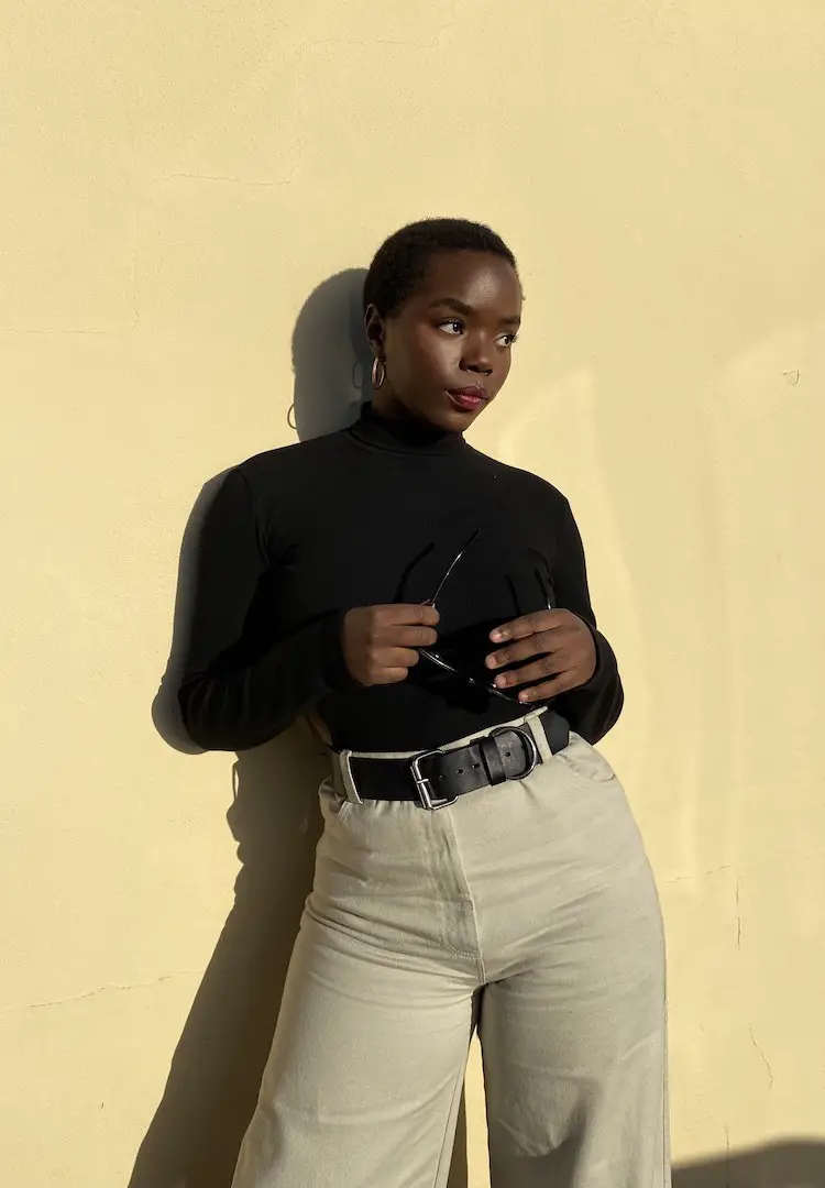 Black Ribbed Turtleneck with Beige High-Waisted Wide-Leg Trousers Black Ribbed Turtleneck with Beige High-Waisted Wide-Leg Trousers — Turtleneck Outfits