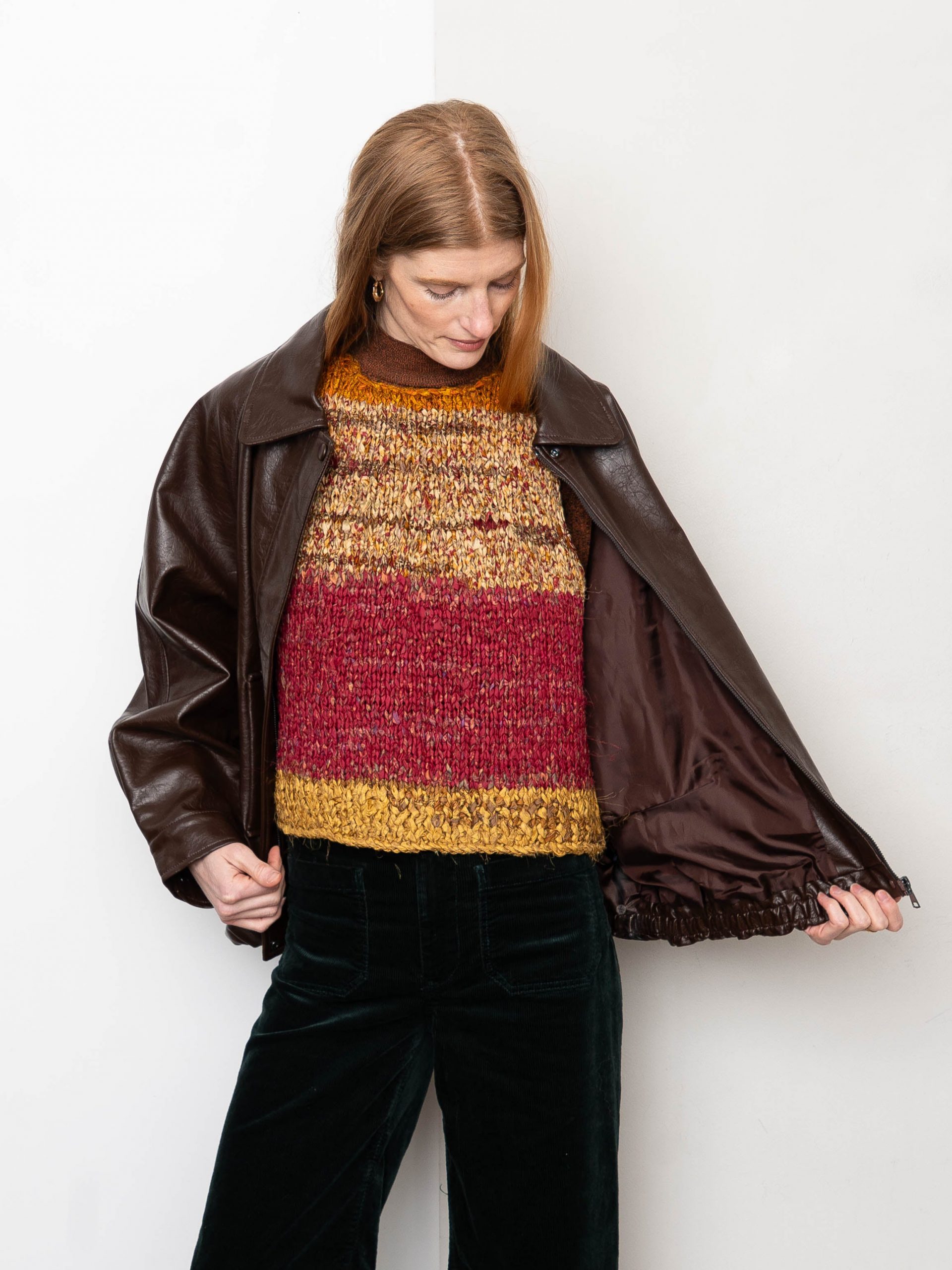 Leather Jacket Over Colorful Vest and Turtleneck Leather Jacket Over Colorful Vest and Turtleneck — Winter Layering Outfits