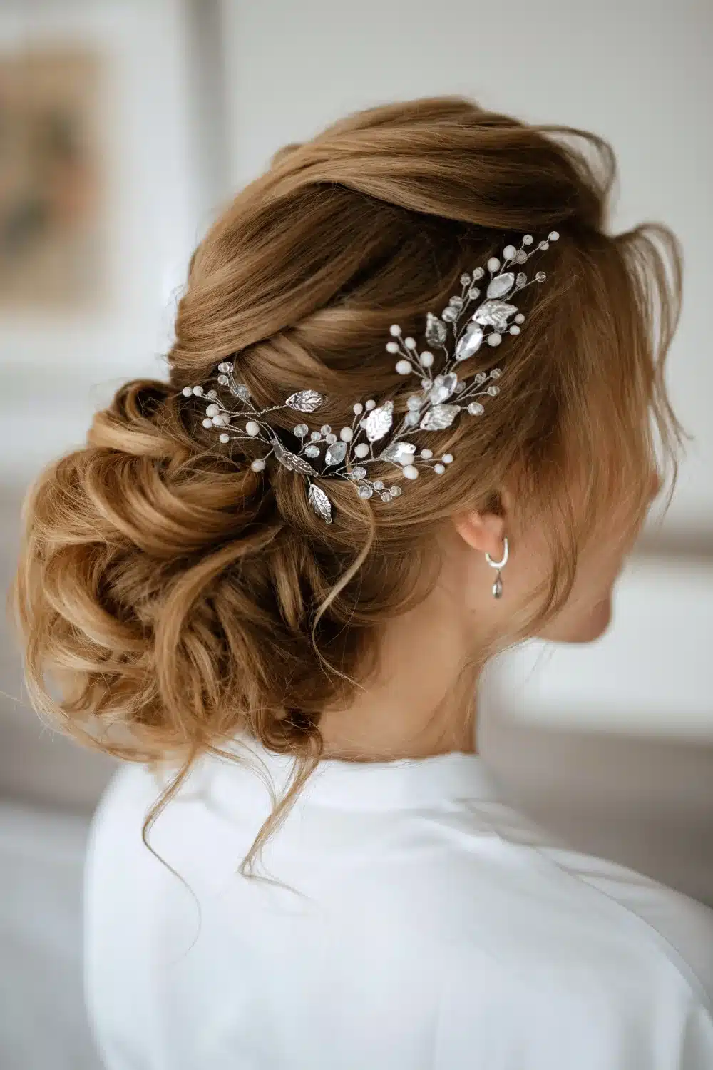 Elegant Updo With Crystal Accessory — Winter Party Hairstyles