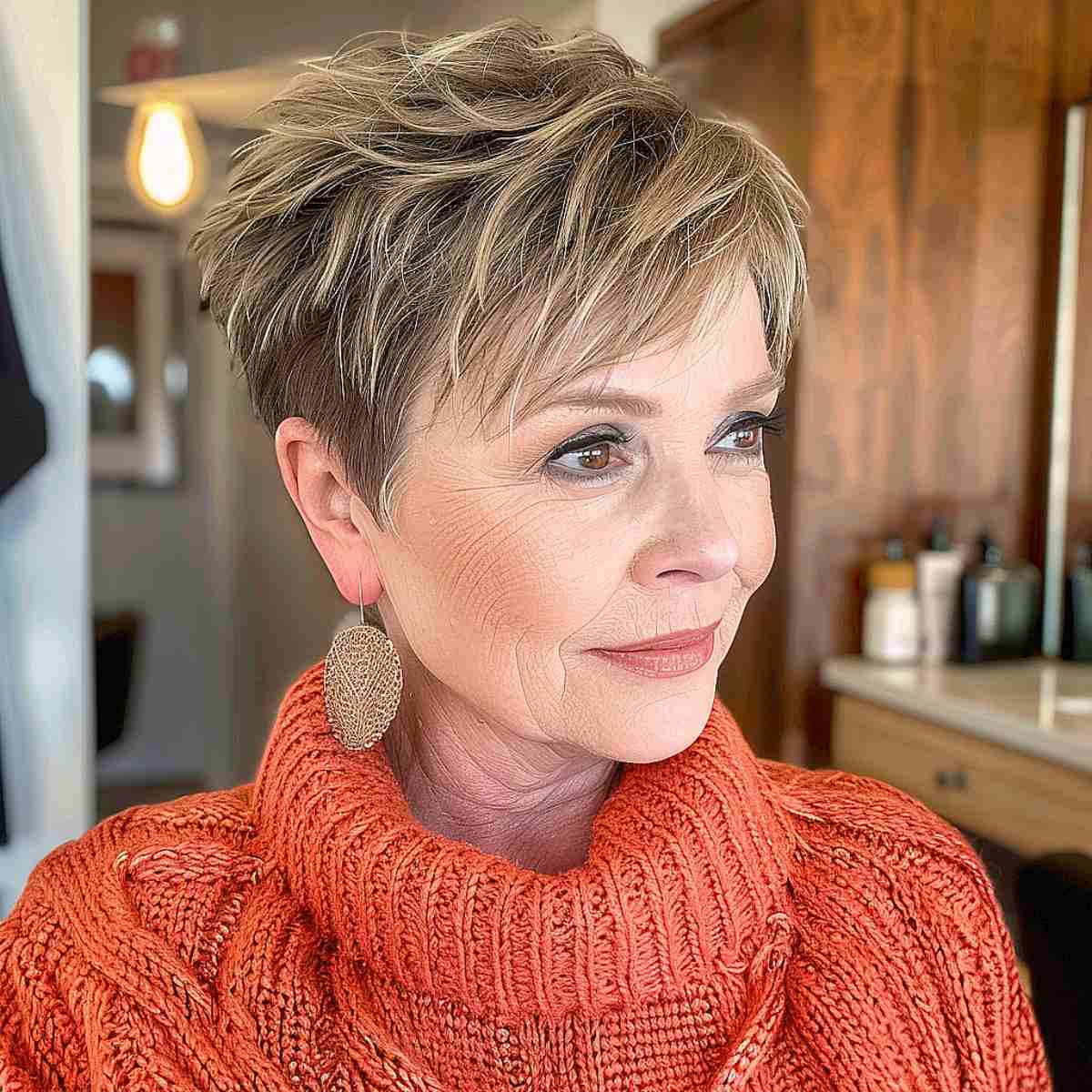 Ear Textured Ash Blonde Pixie Ear Textured Ash Blonde Pixie — Winter Hair Colors for Women Over 60