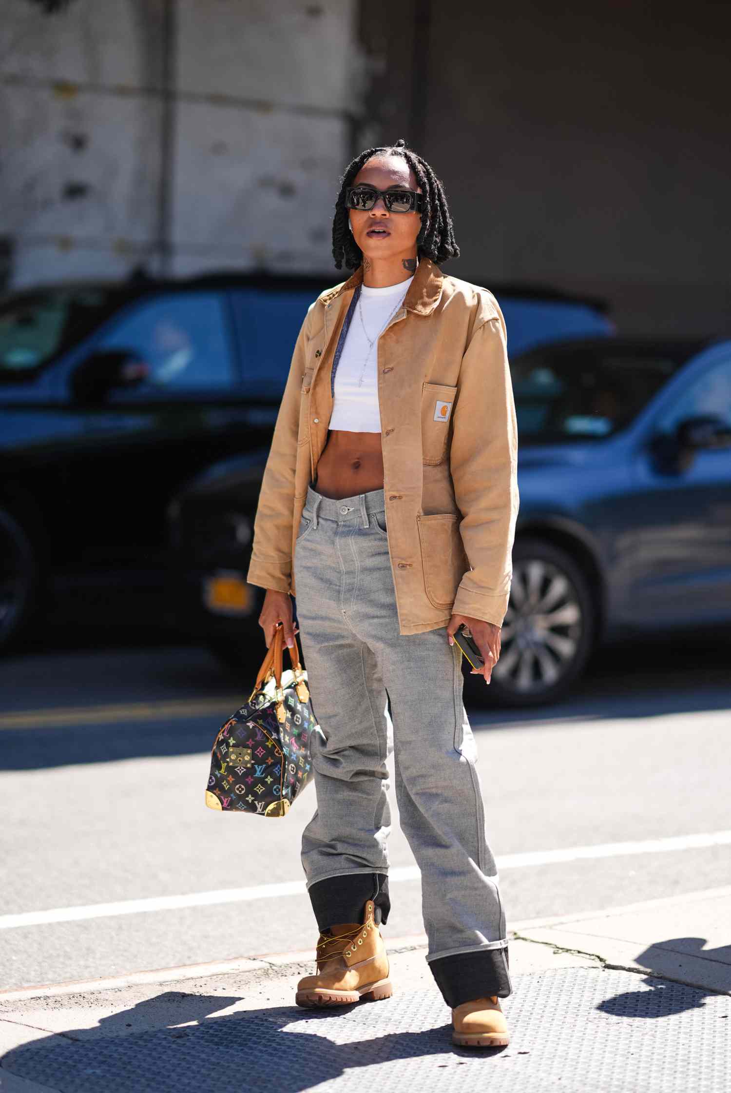 Streetwear Ready: Tan Timberlands with Work Jacket and Crop Top — Timberland Boots Outfits