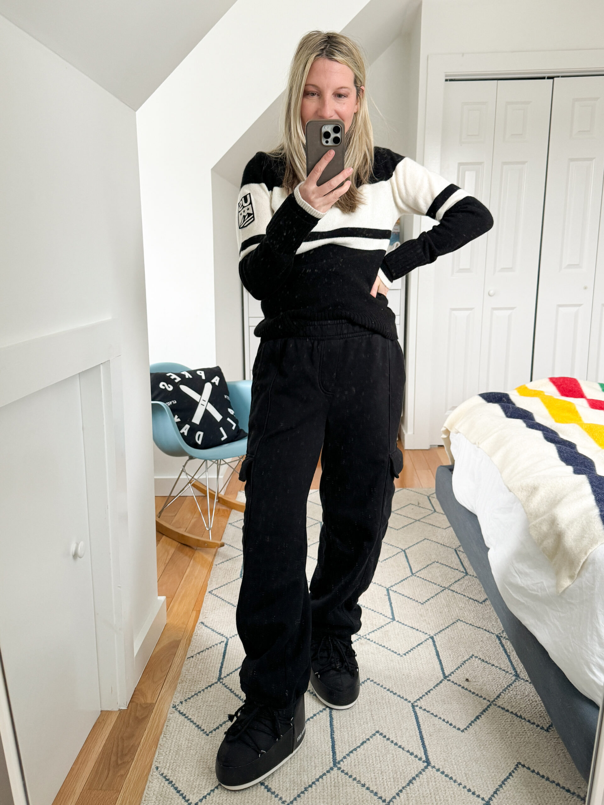 Black Snow Boots with Striped Knit Sweater and Cargo Pants Black Snow Boots with Striped Knit Sweater and Cargo Pants — Snow Boots Outfits