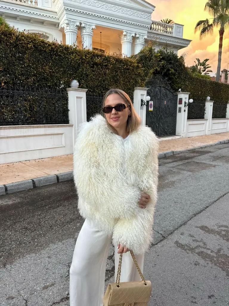 Cream Fuzzy Jacket Paired with Beige Wide-Leg Pants — Neutral Winter Outfits