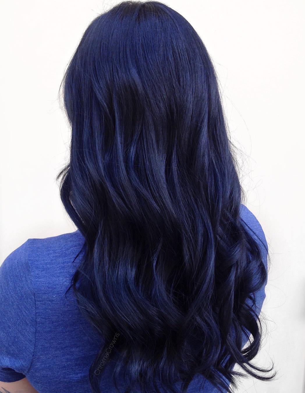 Mid-Back Wavy Blue Black — The Back Of A Woman'S Head Is Displayed Mid-Back Wavy Blue Black — The Back Of A Woman'S Head Is Displayed — Blue Black Hair