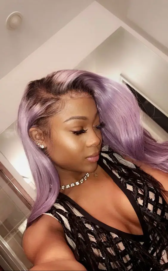 Deep Blue Bob with Blunt Bangs — Winter Hair Colors for Black Women
