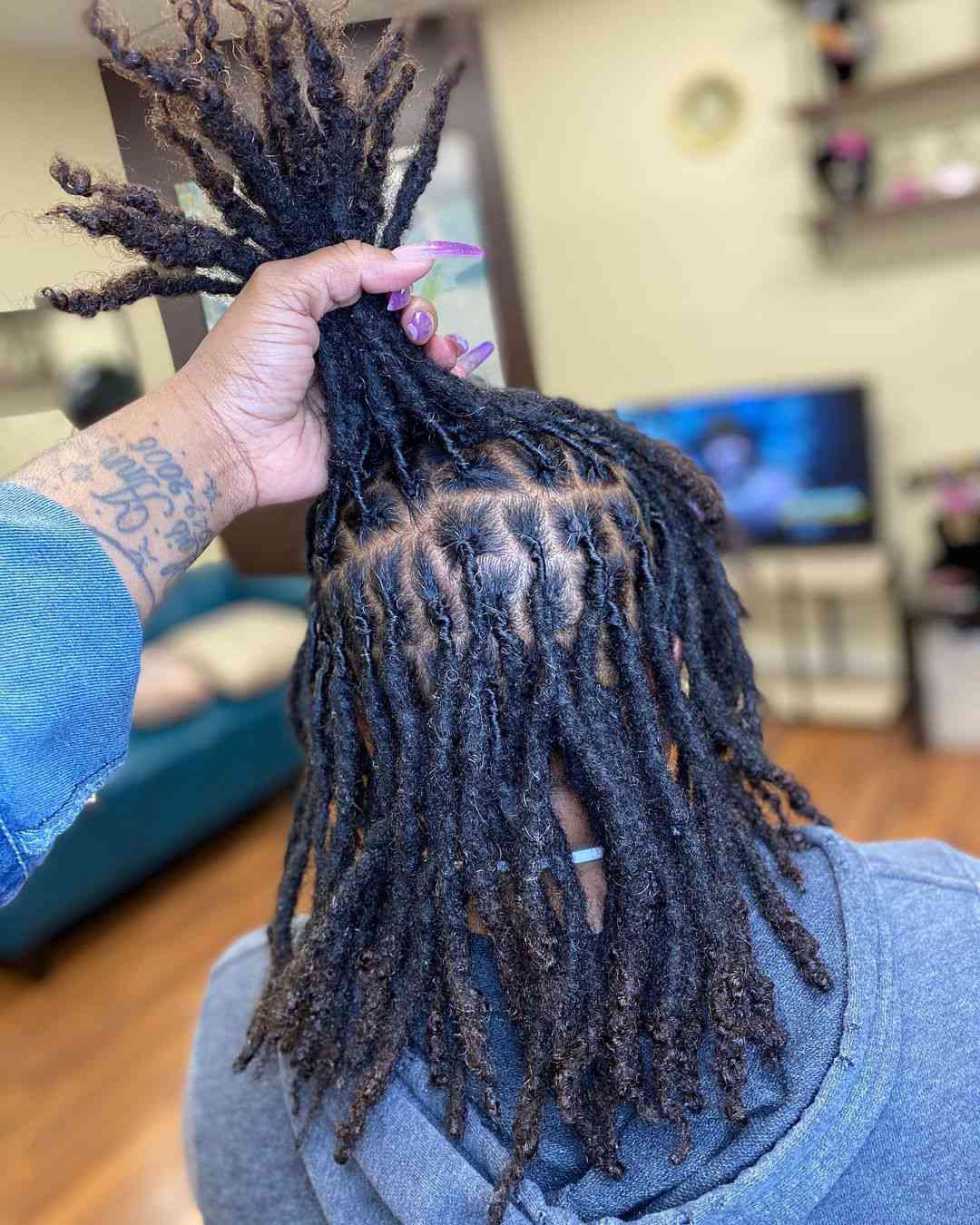 Neatly Sectioned Dark Brown Locs Neatly Sectioned Dark Brown Locs — Winter Loc Styles