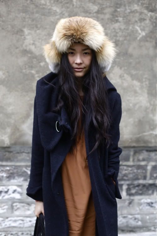 Earthy Tones: Brown and Tan Fur Hat with Navy Coat Earthy Tones: Brown and Tan Fur Hat with Navy Coat — Fur Hat Outfits