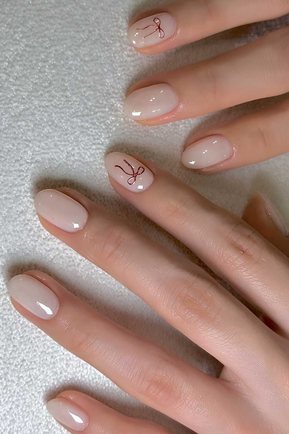 Short Oval Nude with Red Bow Short Oval Nude with Red Bow — Natural Winter Nails