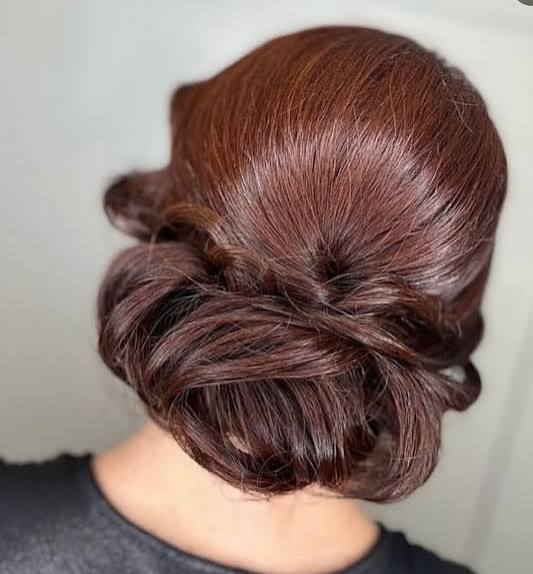 Dark Brown Low Chignon Bun Dark Brown Low Chignon Bun — Winter Date Night Hairstyles