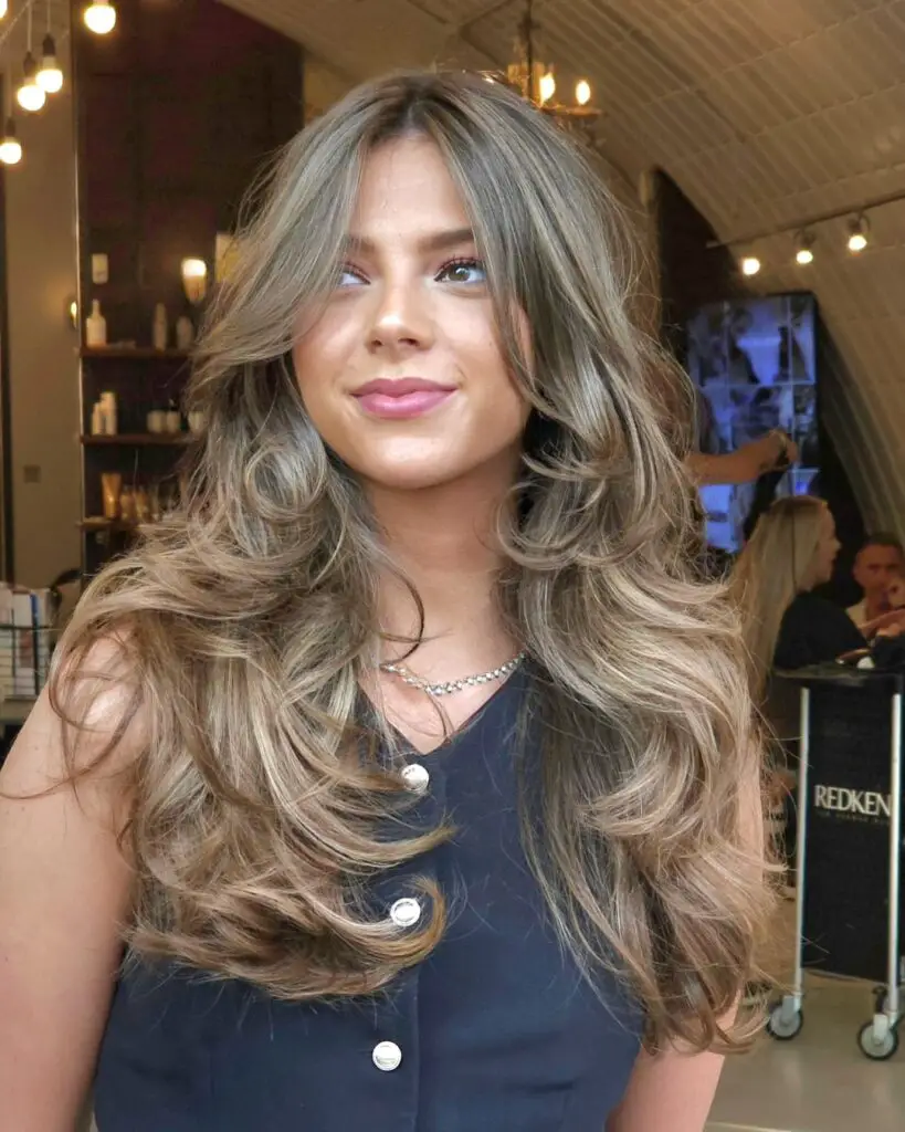 Mid-Back Voluminous Waves With Ash Brown Highlights Mid-Back Voluminous Waves With Ash Brown Highlights — Winter Layered Haircuts