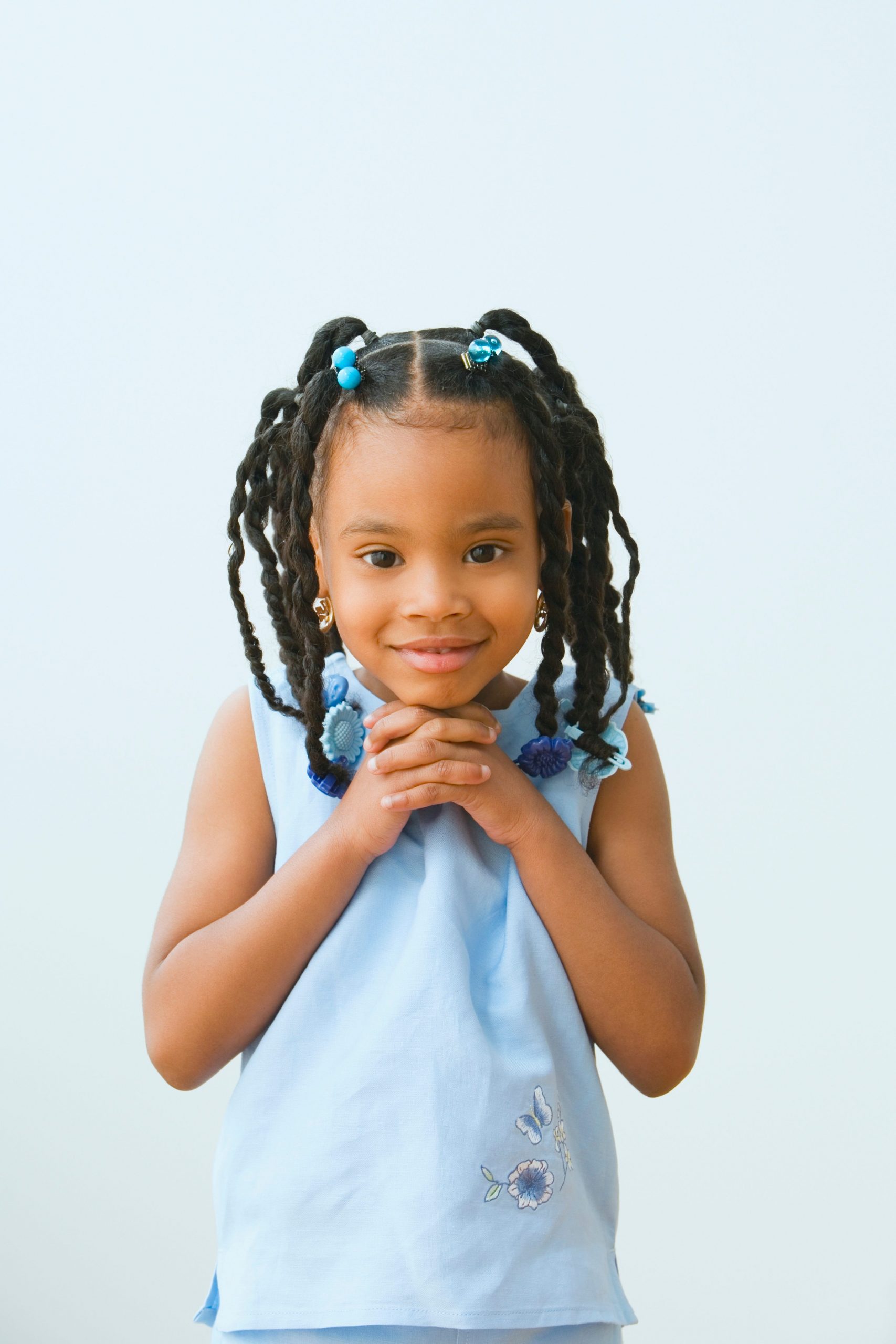Braided Pigtails with Beads and Clips — Winter Hairstyles for Black Kids