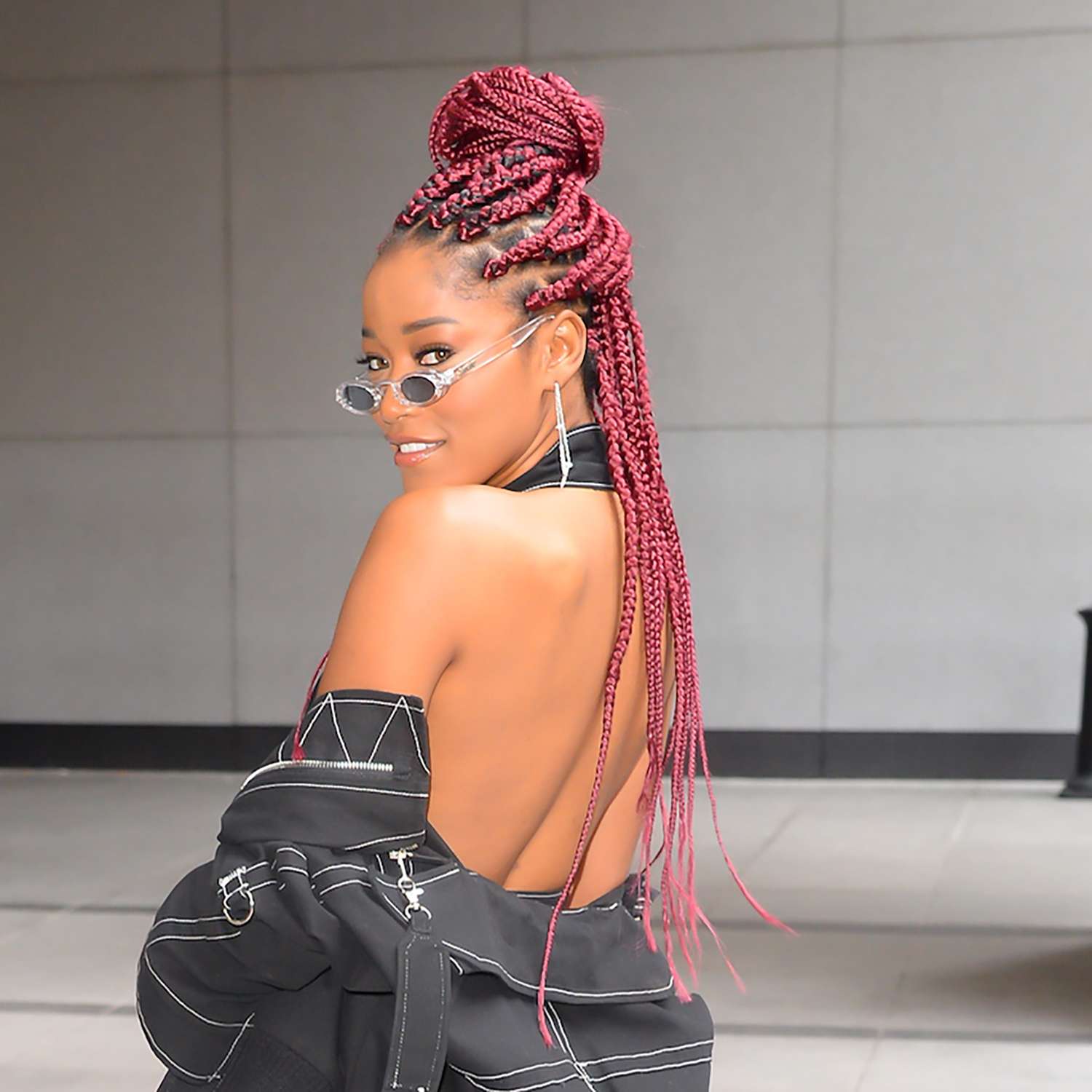 Vibrant Red Box Braids into a High Bun — Winter Braid Colors for Black Women