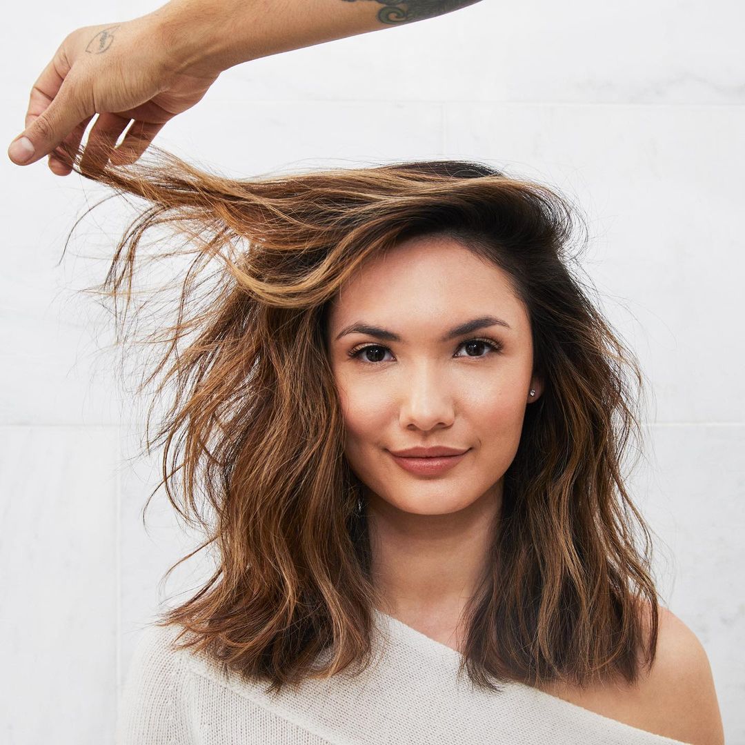 Voluminous Wavy Dark Brown Blowout — Winter Haircuts for Thin Hair