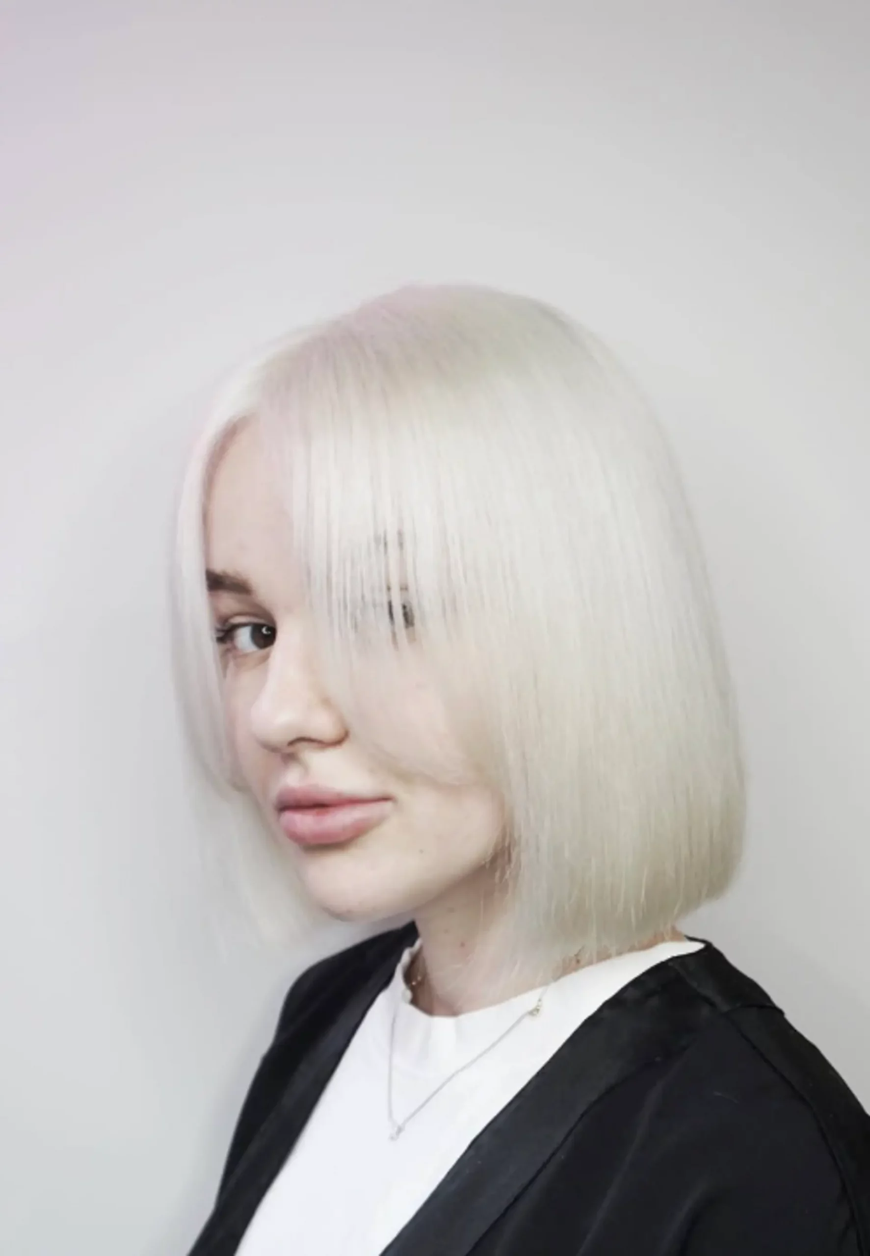 Sleek Icy Blonde Bob With Baby Bangs Sleek Icy Blonde Bob With Baby Bangs — Icy Blonde Hair