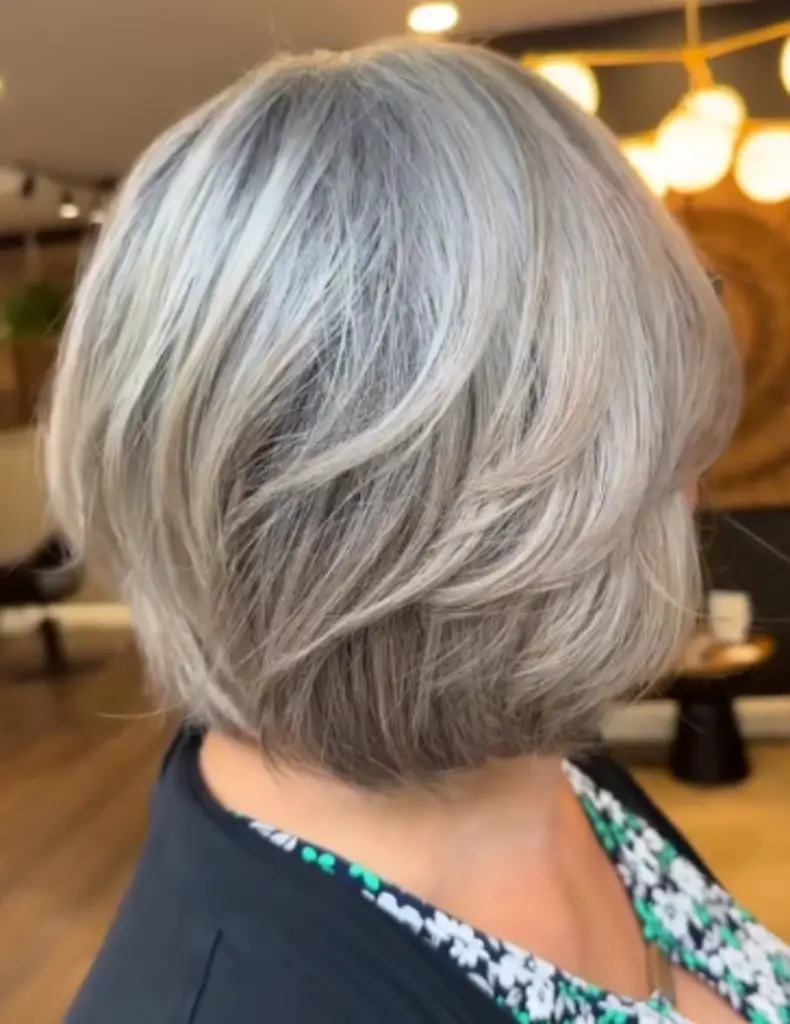 Stacked Bob With Layered Gray Highlights Stacked Bob With Layered Gray Highlights — Gray Blending Highlights