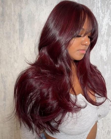Vibrant Cherry Red With Feathered Bangs Vibrant Cherry Red With Feathered Bangs — Cherry Cola Hair Color