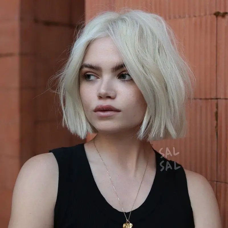 Platinum Blonde Blunt Bob Platinum Blonde Blunt Bob — Winter Haircuts for Round Faces
