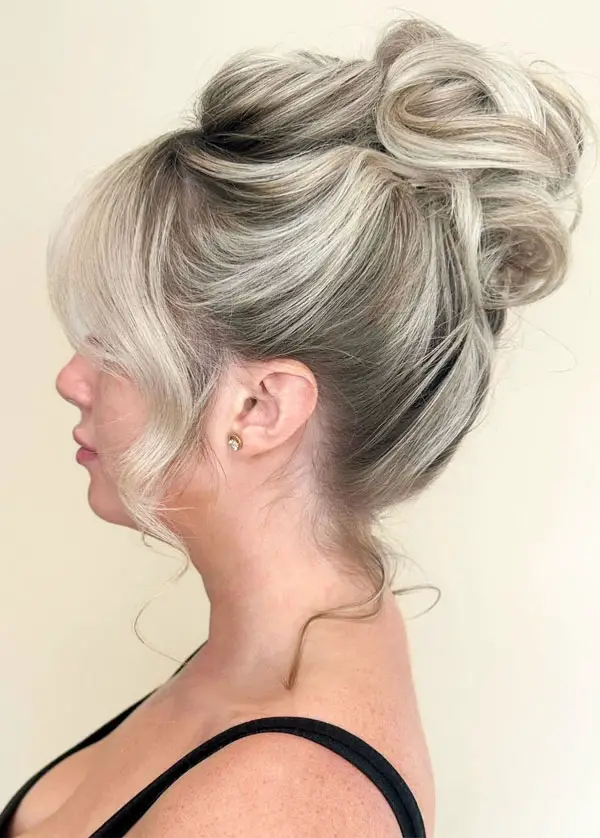 Voluminous High Updo With Curtain Bangs — Winter Updos