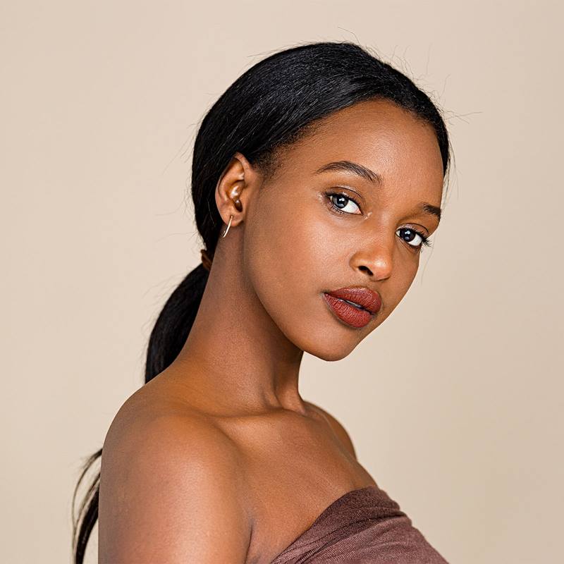 Ponytail with Auburn Highlights — Winter Hair Colors for Black Women