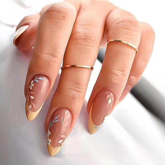 Medium Almond Sheer Nude with Pale Yellow French and Florals Medium Almond Sheer Nude with Pale Yellow French and Florals — Trendy Simple Nail Designs