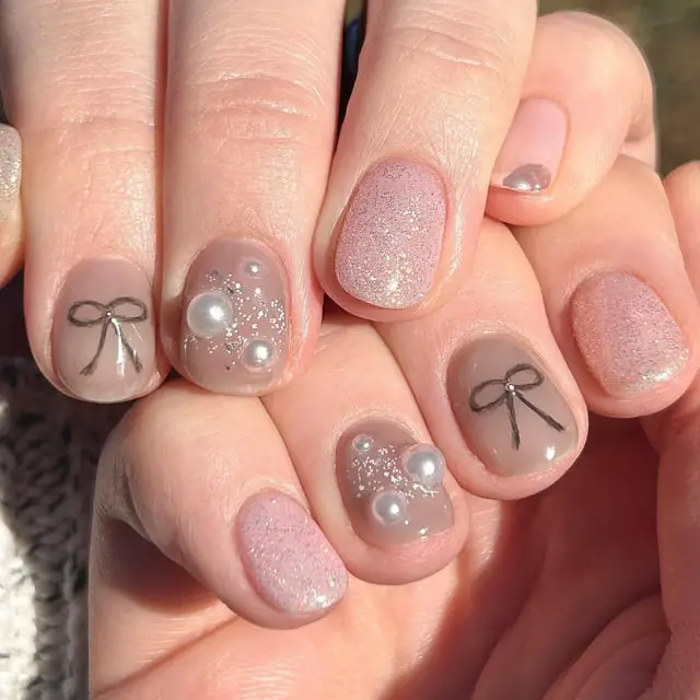 Nude Beige Pink with Black Bows and Pearls Nude Beige Pink with Black Bows and Pearls — Simple Winter Nails