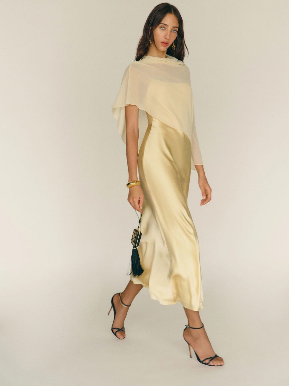 Pale Yellow Satin Slip Dress with Draped Overlay and Black Heels — Winter Wedding Guest Outfits