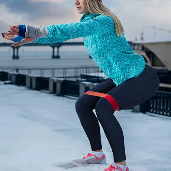 Teal Patterned Top and Leggings with Resistance Band — Winter Workout Outfits