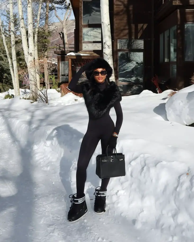 Monochromatic Black Jumpsuit and Fur Accents for Sleek Apres Ski Monochromatic Black Jumpsuit and Fur Accents for Sleek Apres Ski — Apres Ski Outfits