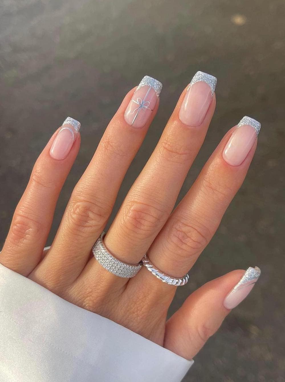 Glossy Sheer Pink Glitter French Bow Nails Glossy Sheer Pink Glitter French Bow Nails — Winter Square Nails