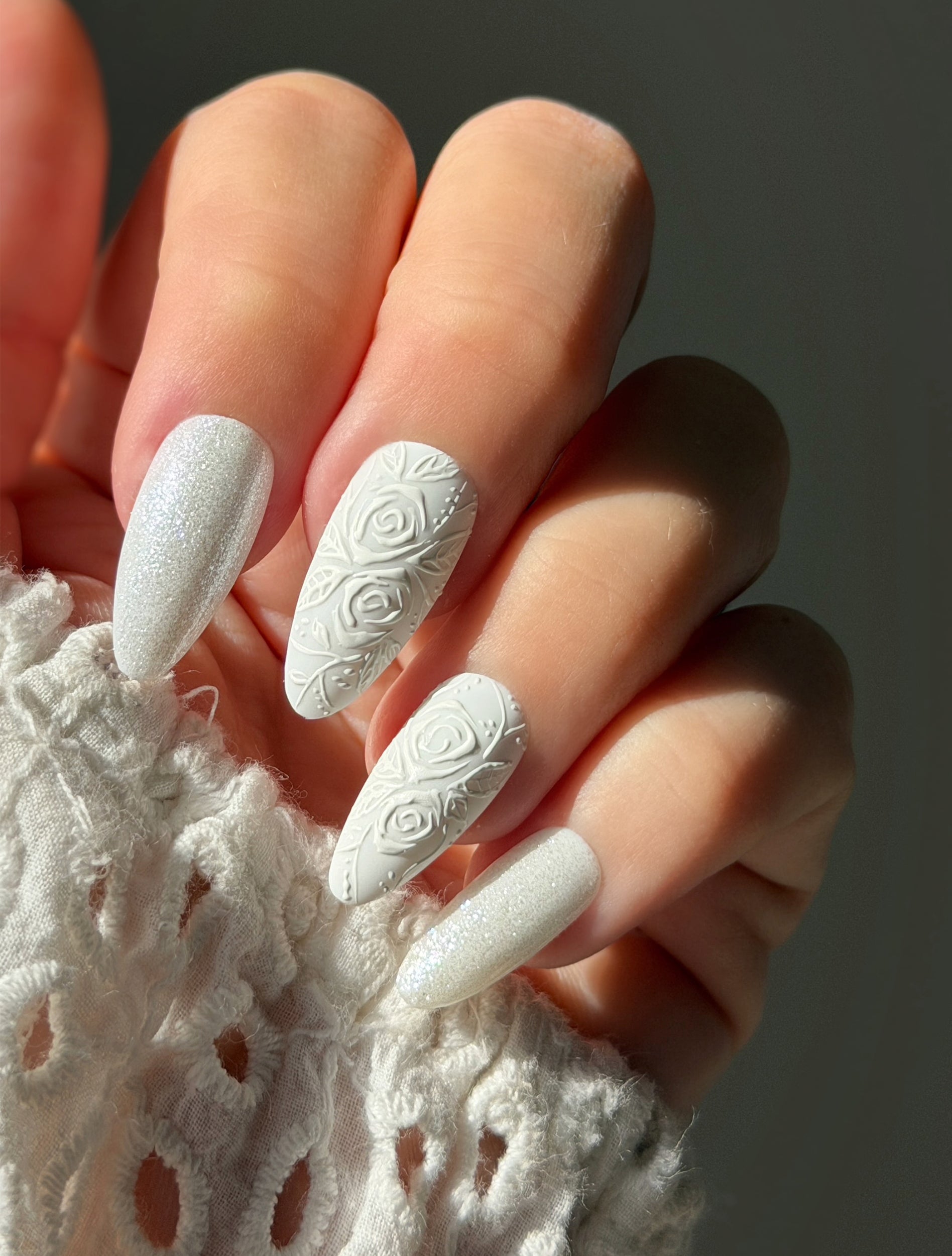 Matte White Embossed Snowflake Oval Nails Matte White Embossed Snowflake Oval Nails — Classy Winter Nails