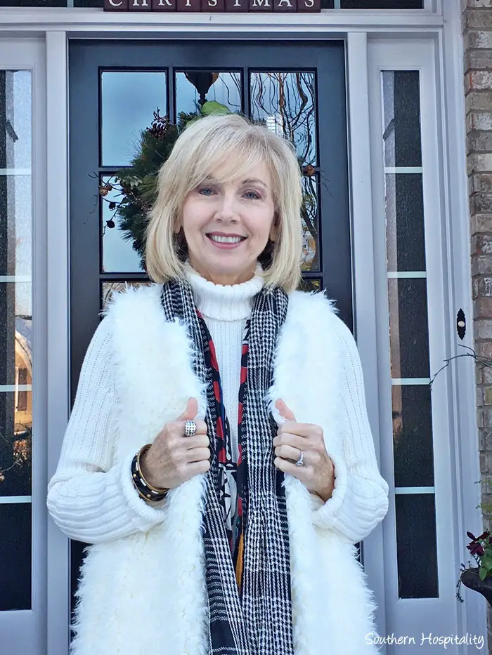 White Fuzzy Vest Over Turtleneck and Black Leggings — Casual Winter Outfits for Women Over 50