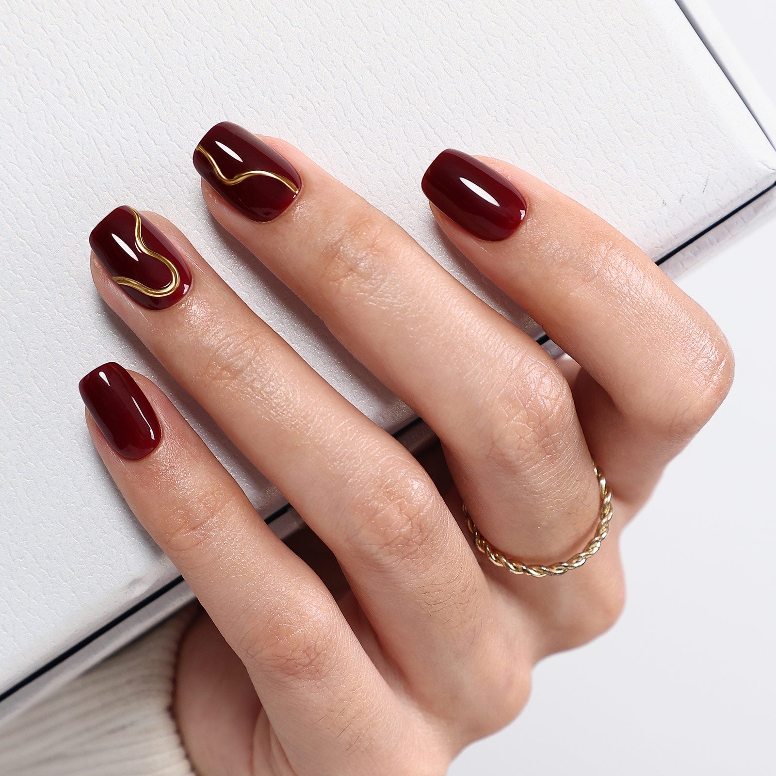 Burgundy Red with Gold Foil Lines Burgundy Red with Gold Foil Lines — Short Winter Square Nails