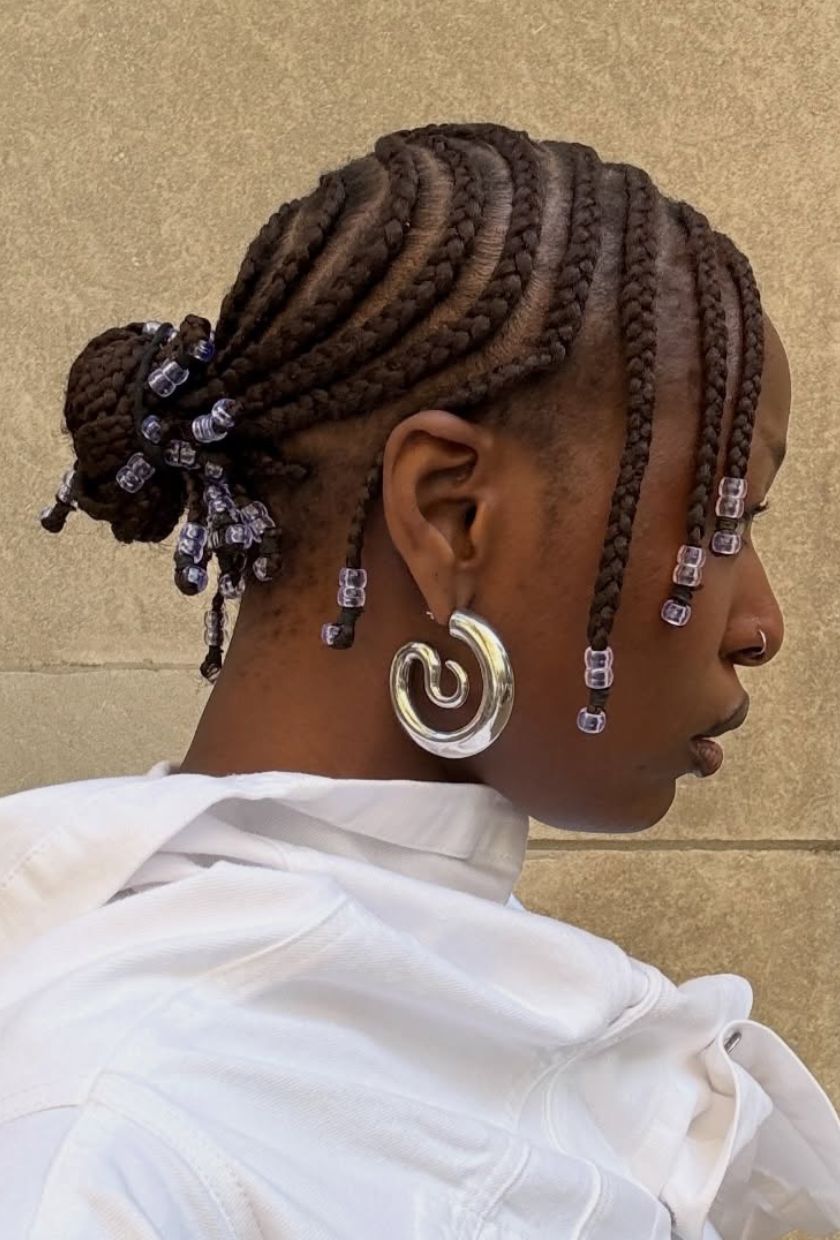 Braided Bun With Loose Strands — Cute Winter Hairstyles