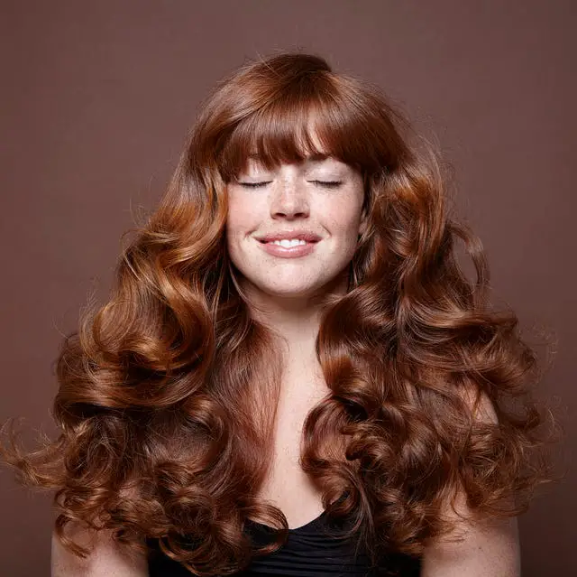 Deep Rich Red With Voluminous Curls Deep Rich Red With Voluminous Curls — Winter Hair Colors for Redheads