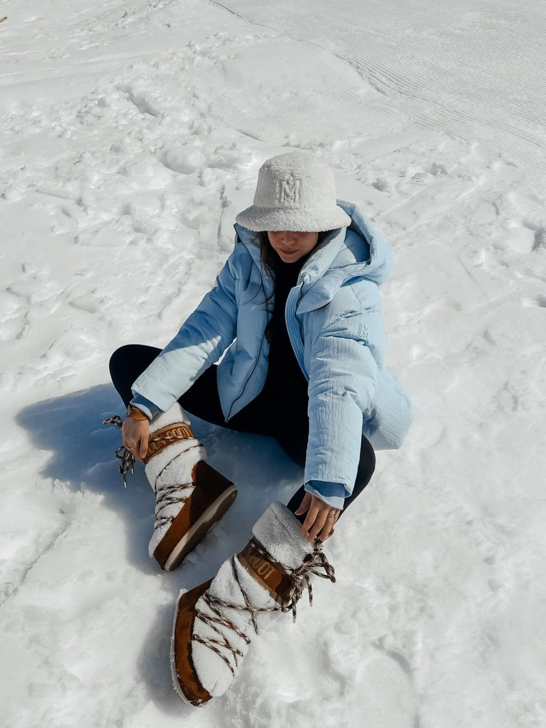 Light Blue Puffer Jacket with White and Brown Snow Boots Light Blue Puffer Jacket with White and Brown Snow Boots — Snow Boots Outfits