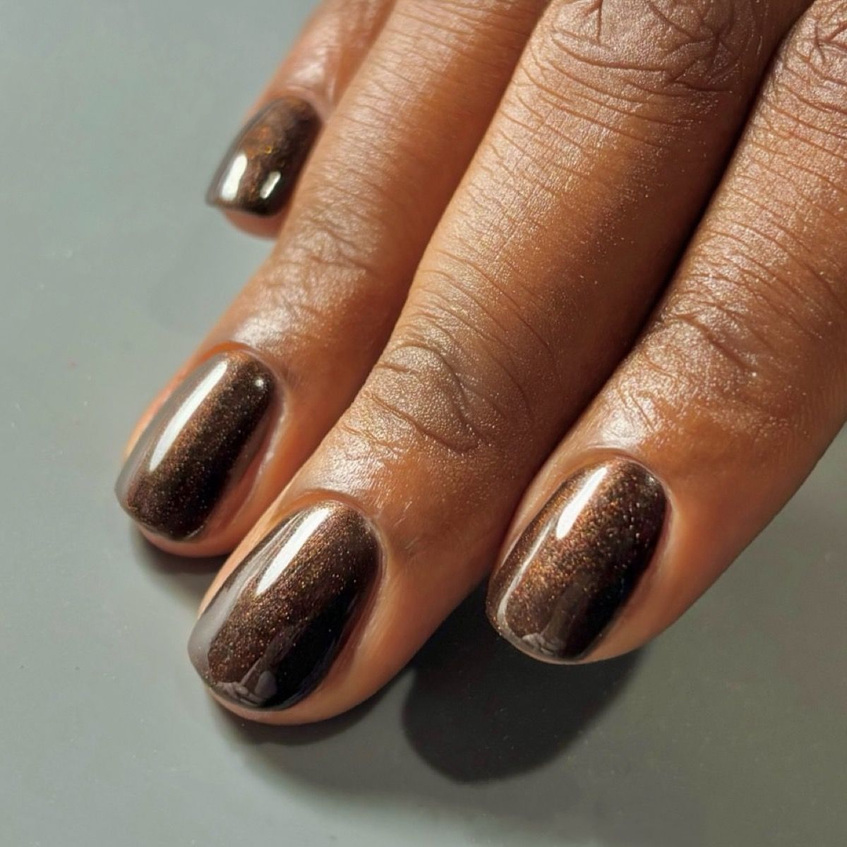 Golden Shimmer Deep Brown Golden Shimmer Deep Brown — Winter Nail Colors for Dark Skin